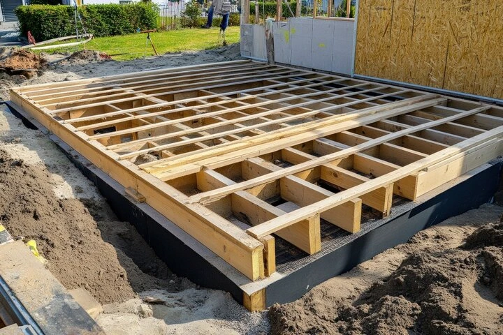 Wood deck installation in Louisville KY using pressure-treated lumber and cedar